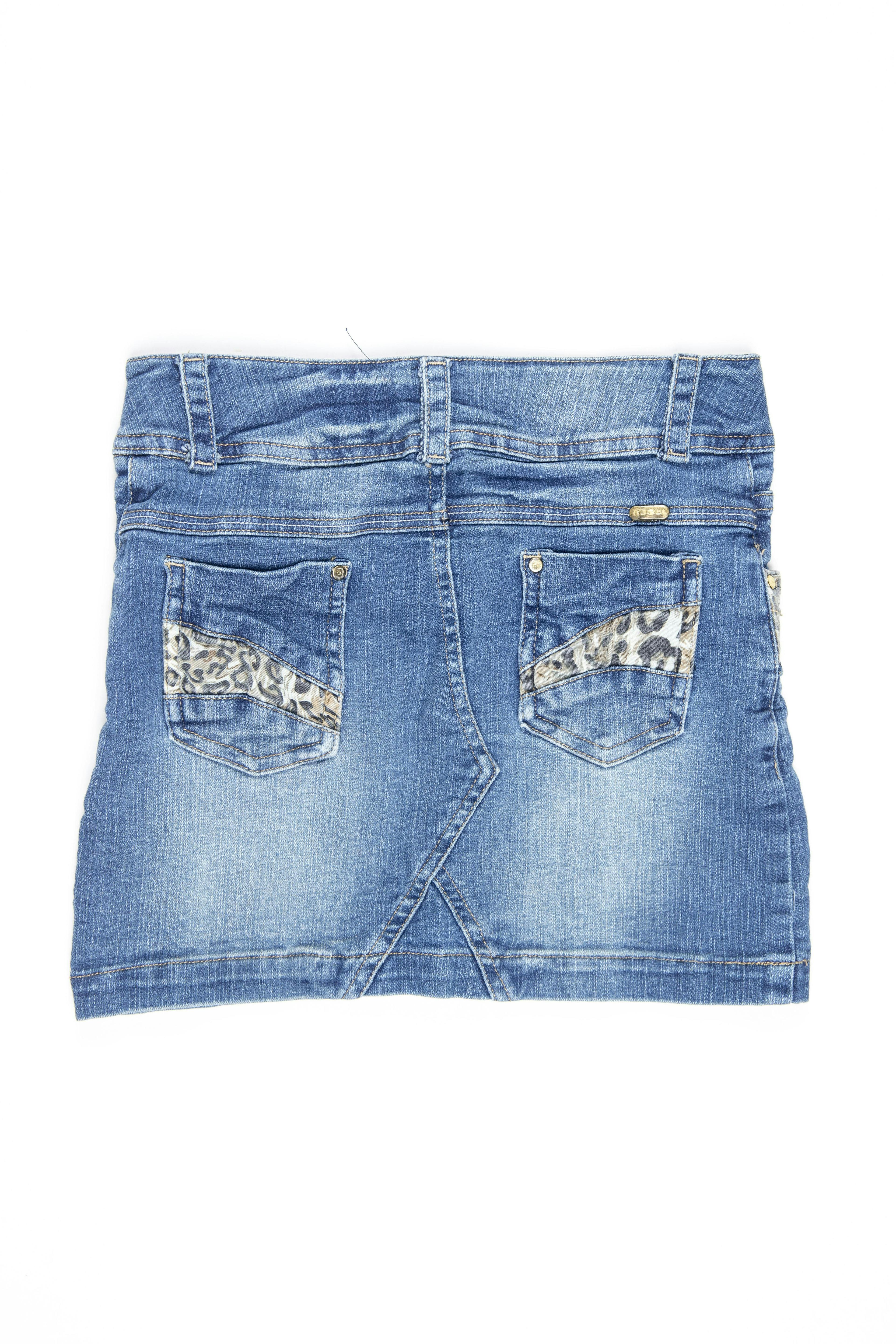 Falda de jean con animal print en bolsillos. Cintura regulable - Bugui