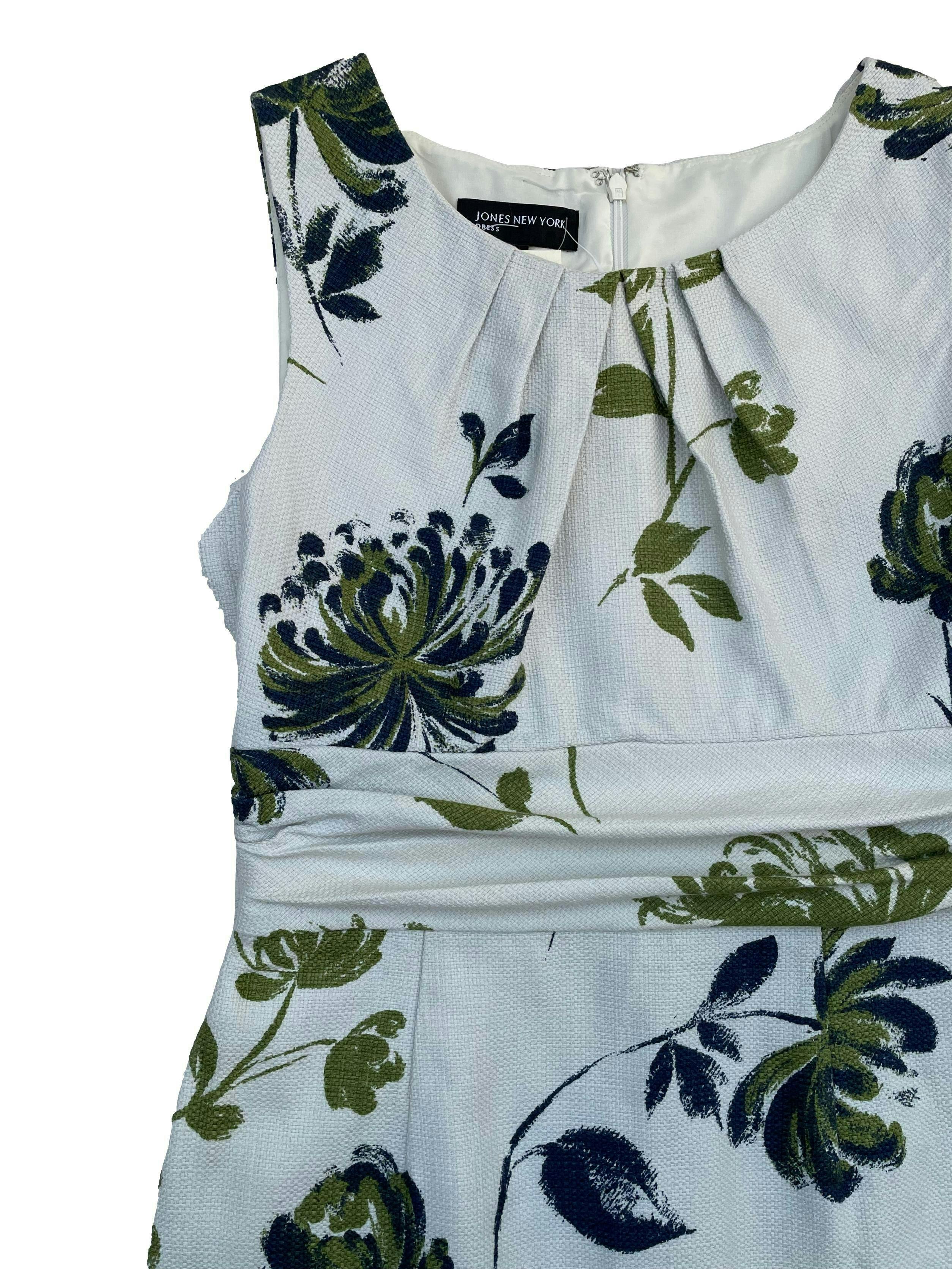 Vestido Jones New York tela rígida 100% algodón, crema con hojas verde y azules, forrado y con cierre invisible en la espalda. Busto 98cm Cintura 76cm Largo 100cm