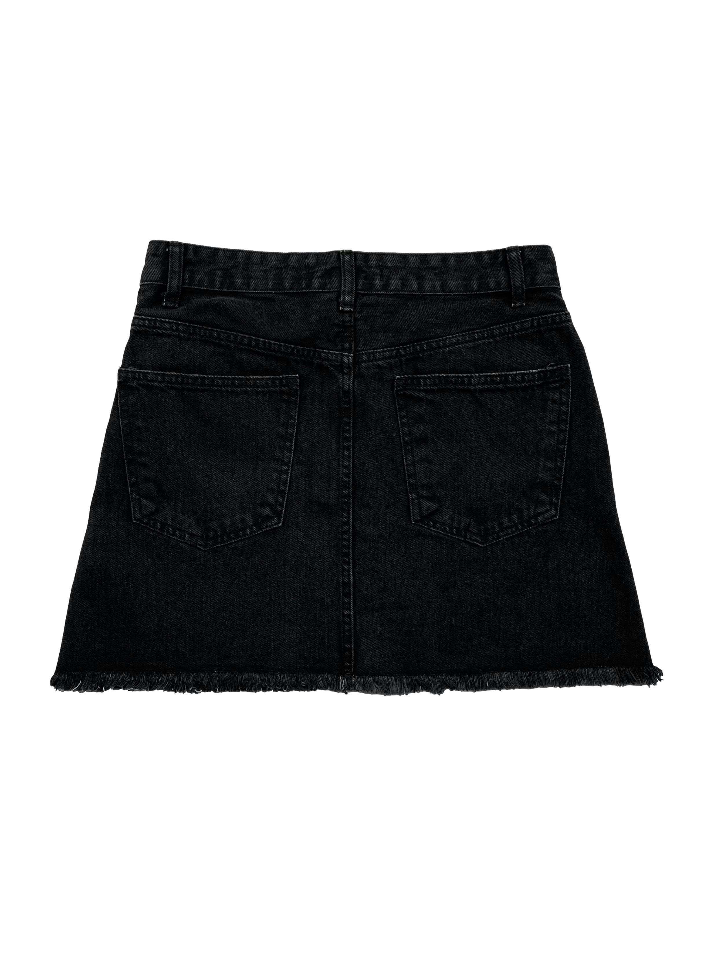 Falda jean Cherokee negra efecto lavado con basta desflecada. Cintura 72cm Largo 41cm