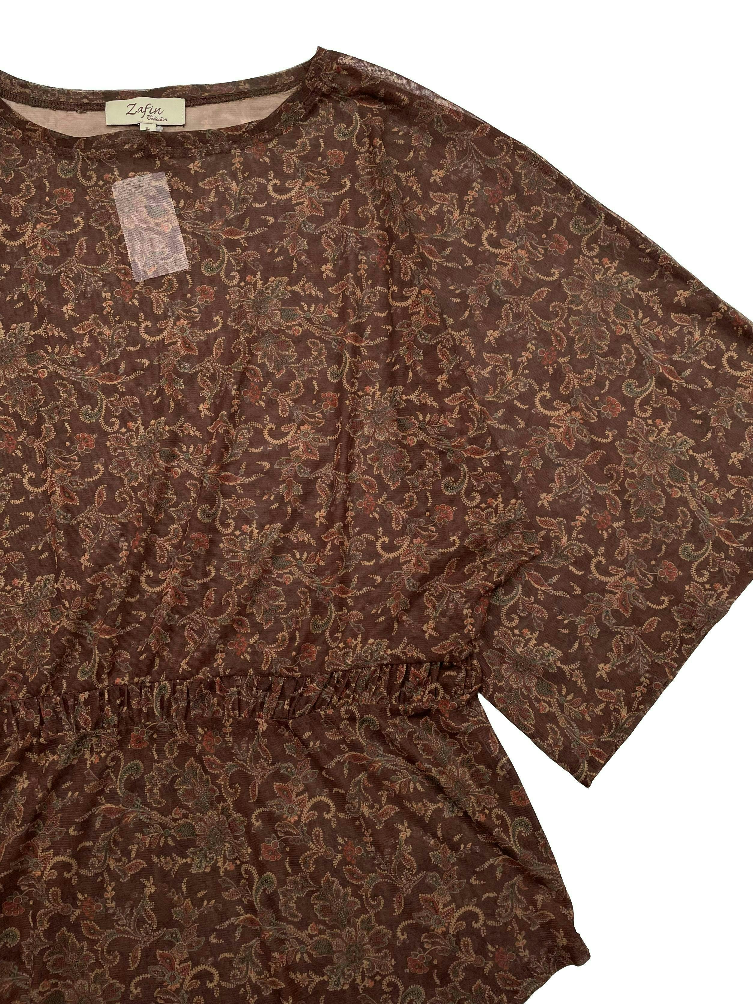 Blusa Zafin de mesh marrón con paisley al tono y elástico en la cintura. Largo 65cm