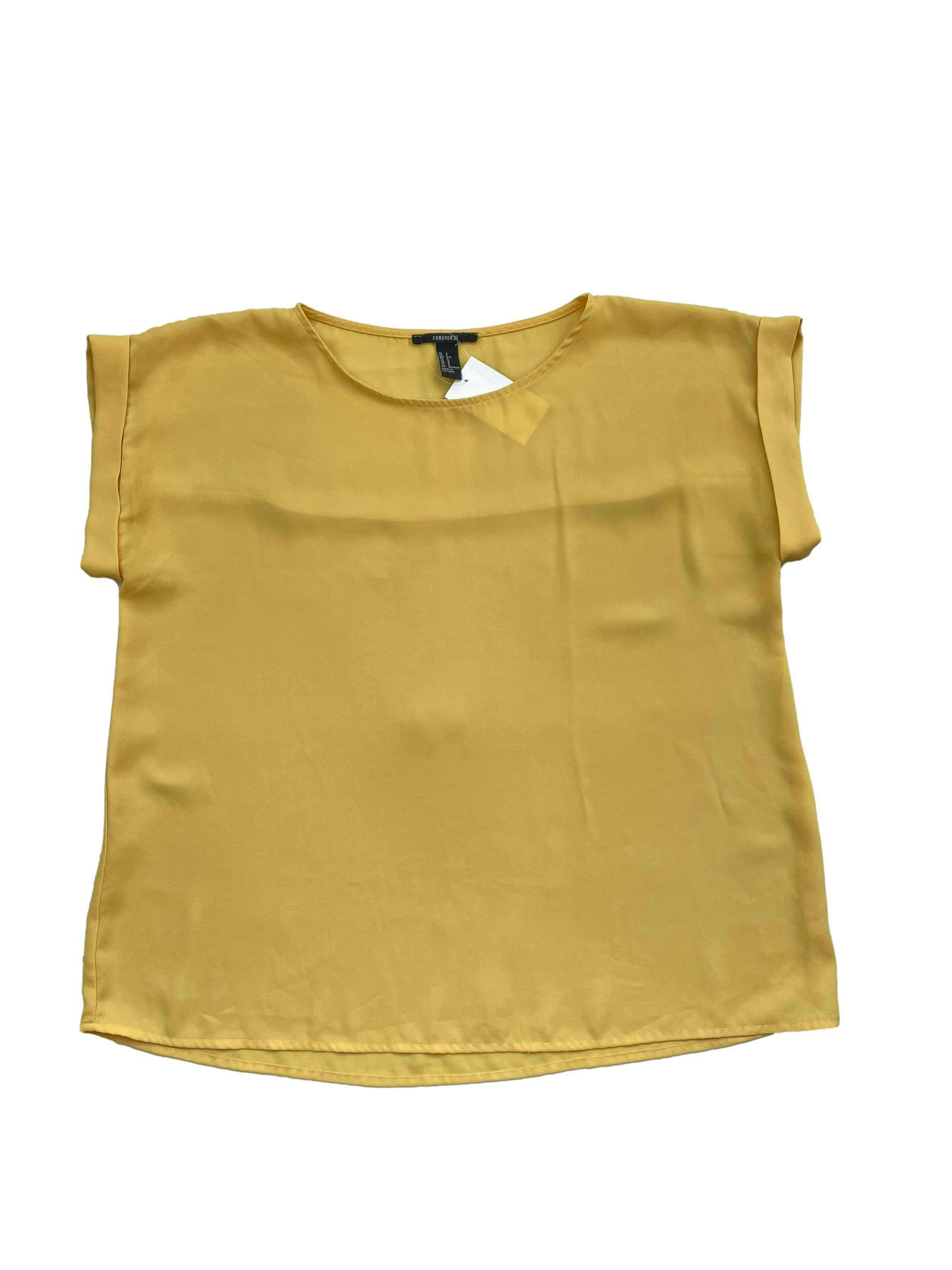 Blusa oversized Forever 21 , amarilla de gasa con transparencia media , mangas cortas. Busto 106 cm , Largo 60 cm.