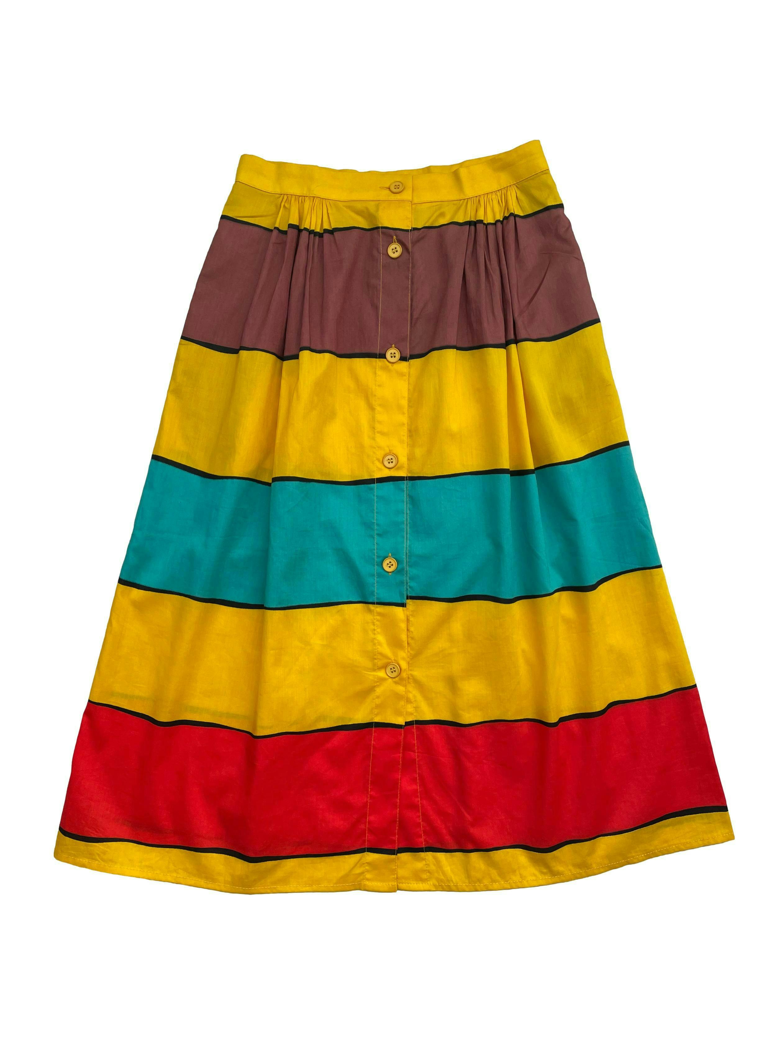 Falda vintage con franjas en amarillo, celeste y rojo, tela 100% algodón, con botones frontales. Cintura 60cm , Largo 68cm.