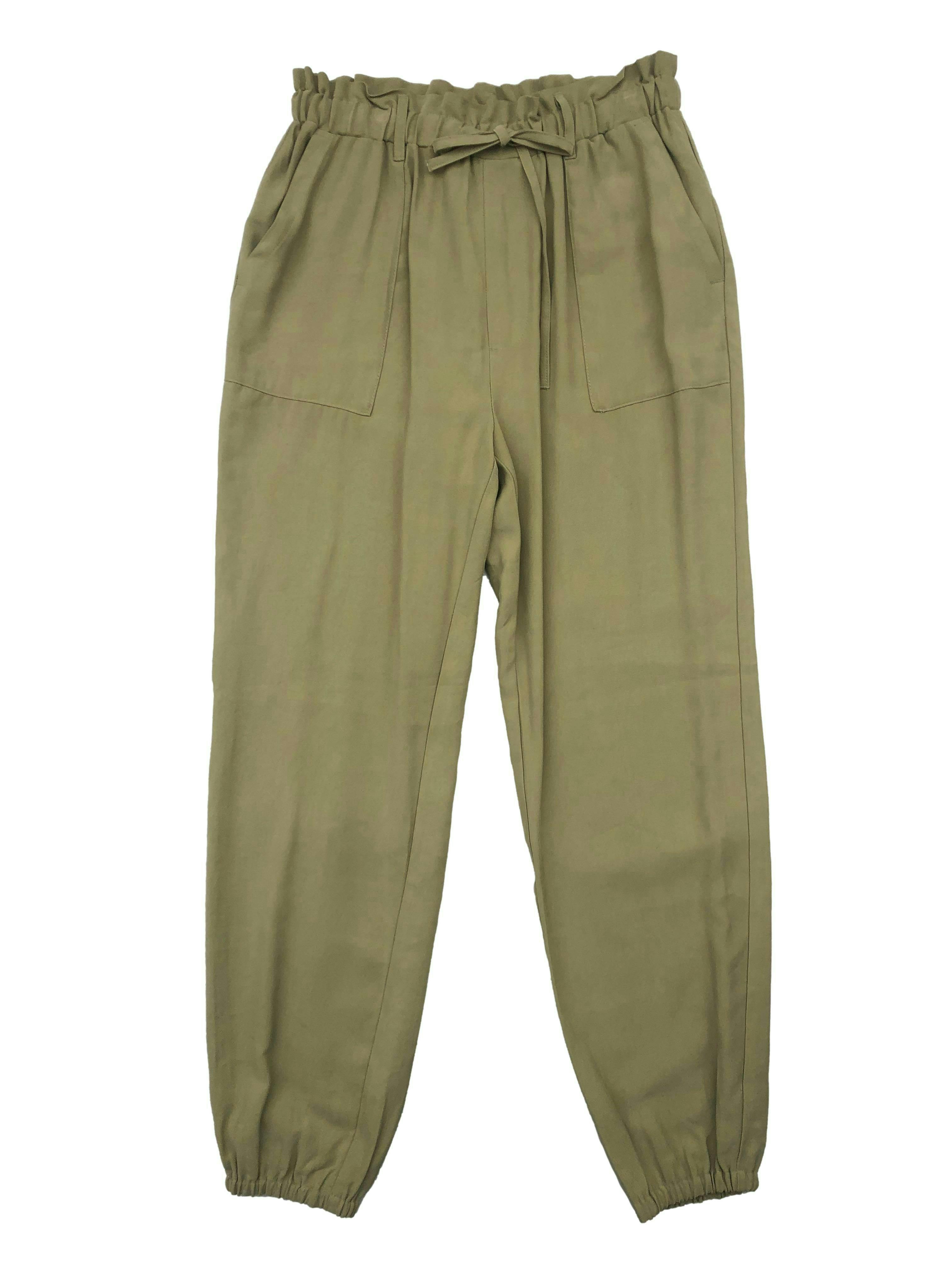 Pantalón INC verde, tela fresca, elástico en cintura y basta, bolsillos laterales. Cintura 68cm largo 100cm