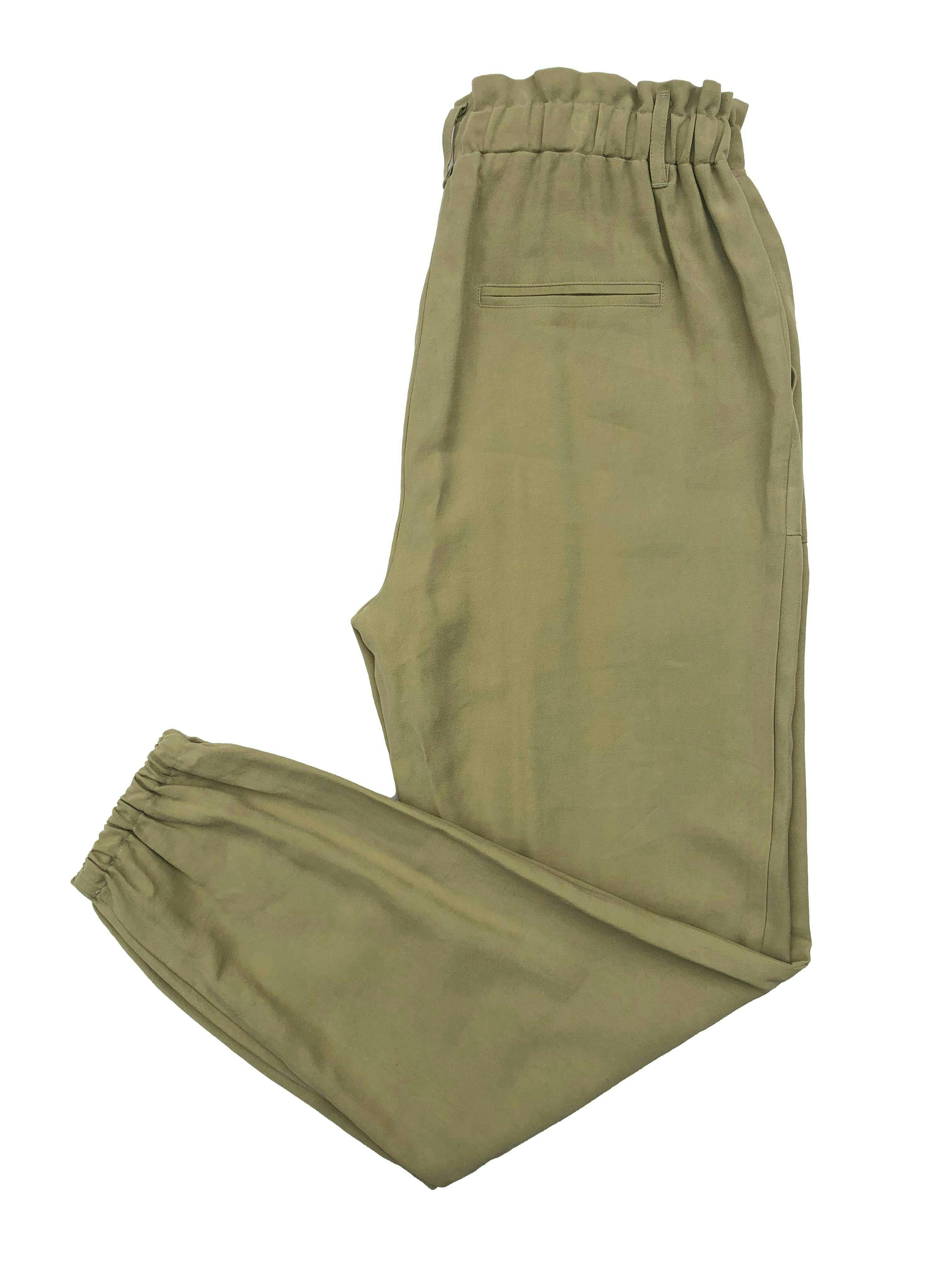 Pantalón INC verde, tela fresca, elástico en cintura y basta, bolsillos laterales. Cintura 68cm largo 100cm