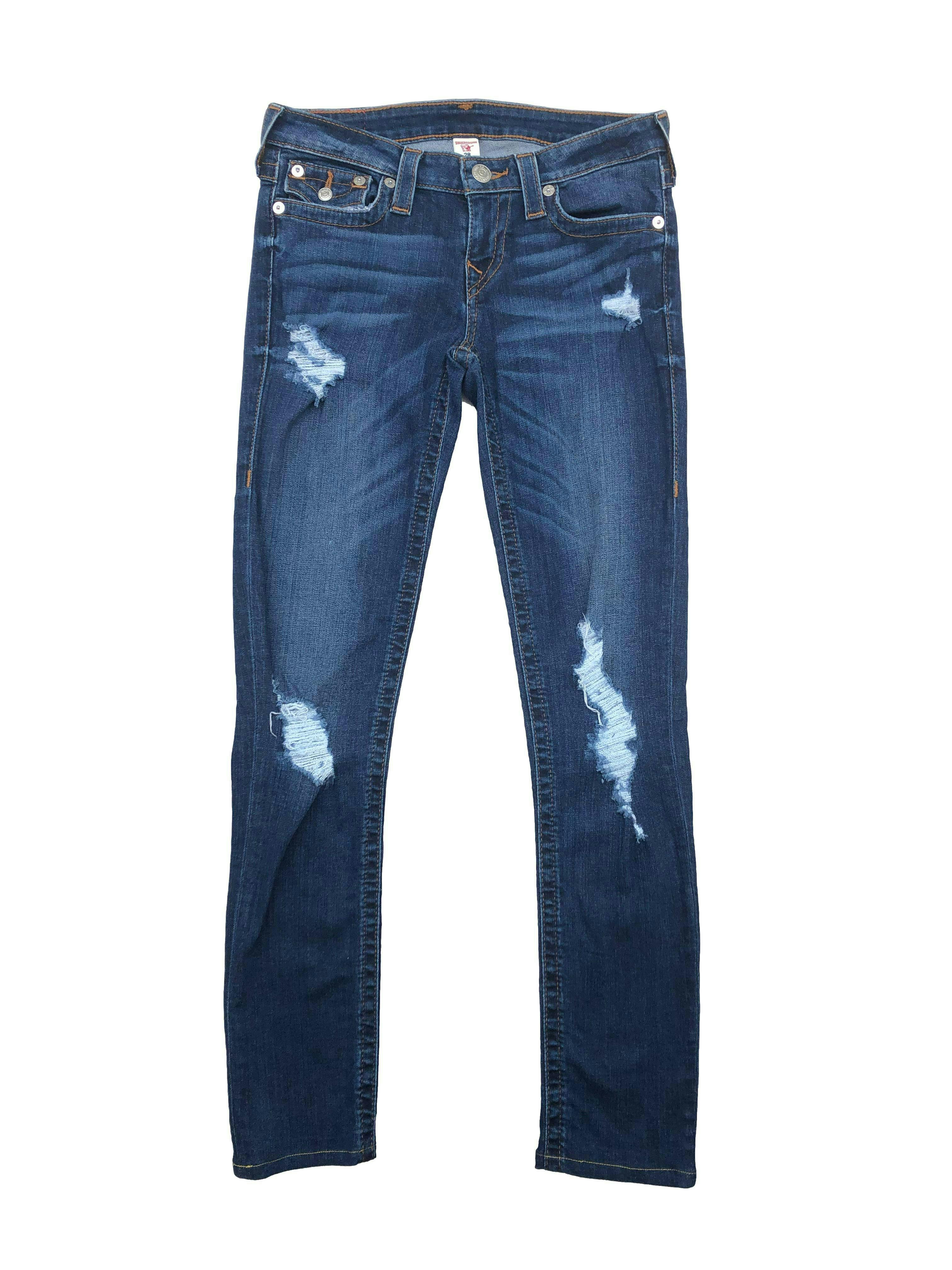 Skinny jean True Religion azul con rasgados y focalizado, Cintura 78cm Tiro 20cm Largo 100cm. Precio original S/ 600