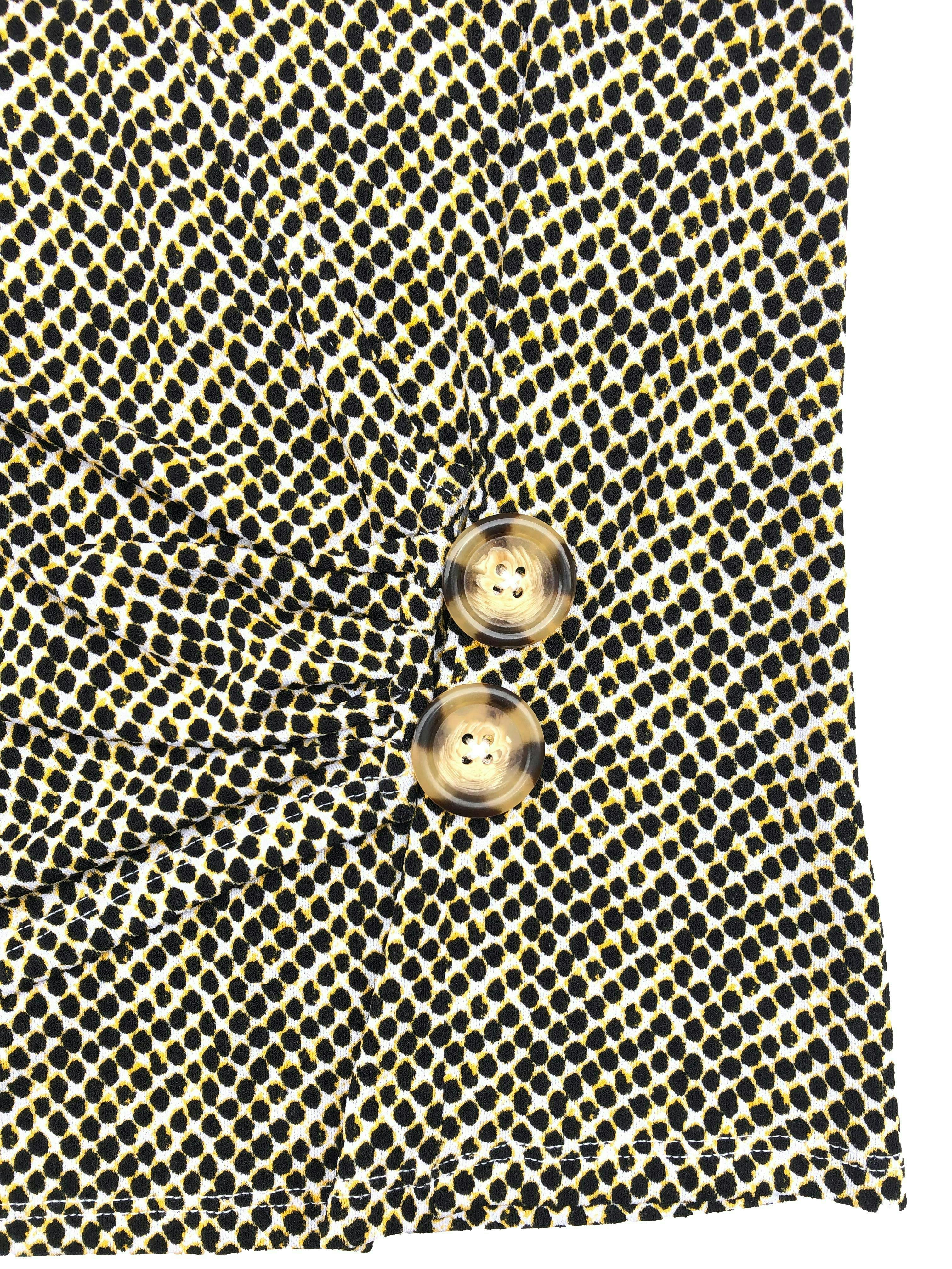 Blusa stretch Worthington animal print, delantero cruzado con botones al lado. Busto 100cm Largo 55cm
