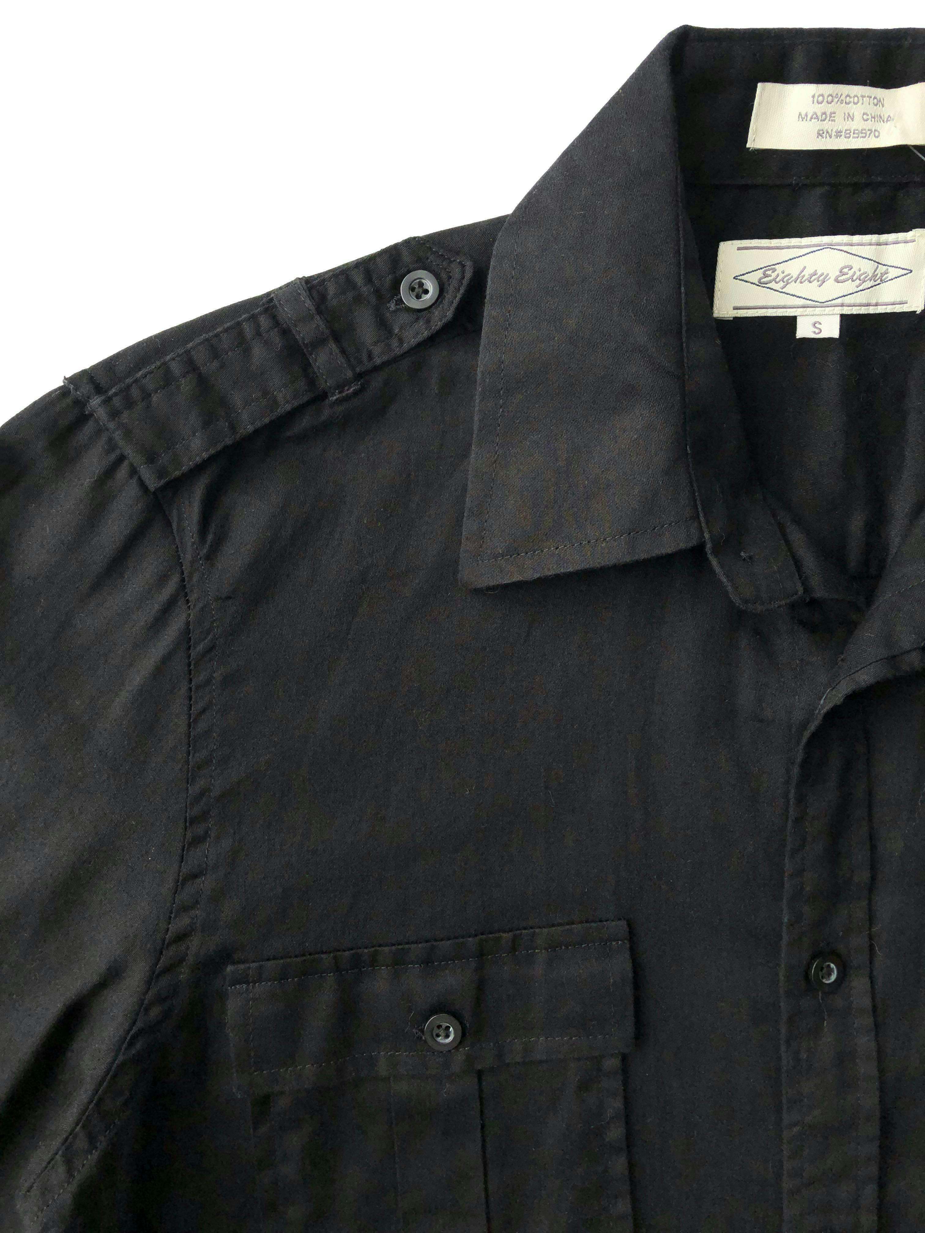 Blusa oversize negra 100% algodón con bolsillos y trabillas en hombros. Busto 108cm, Largo 65cm.