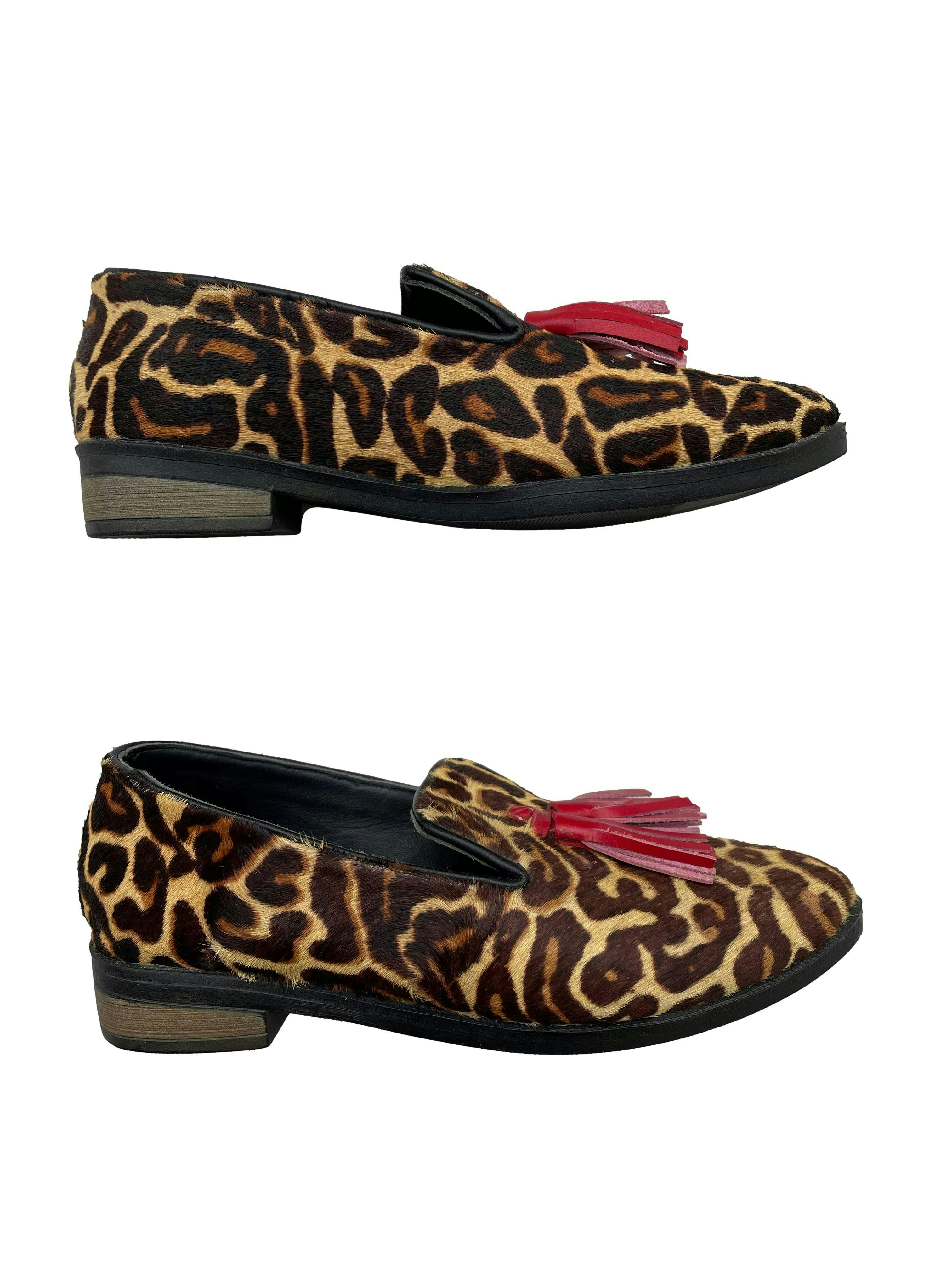 Mocasines Trendy Shoes animal print efecto pelo con borlas rojas. Estado 9/10.