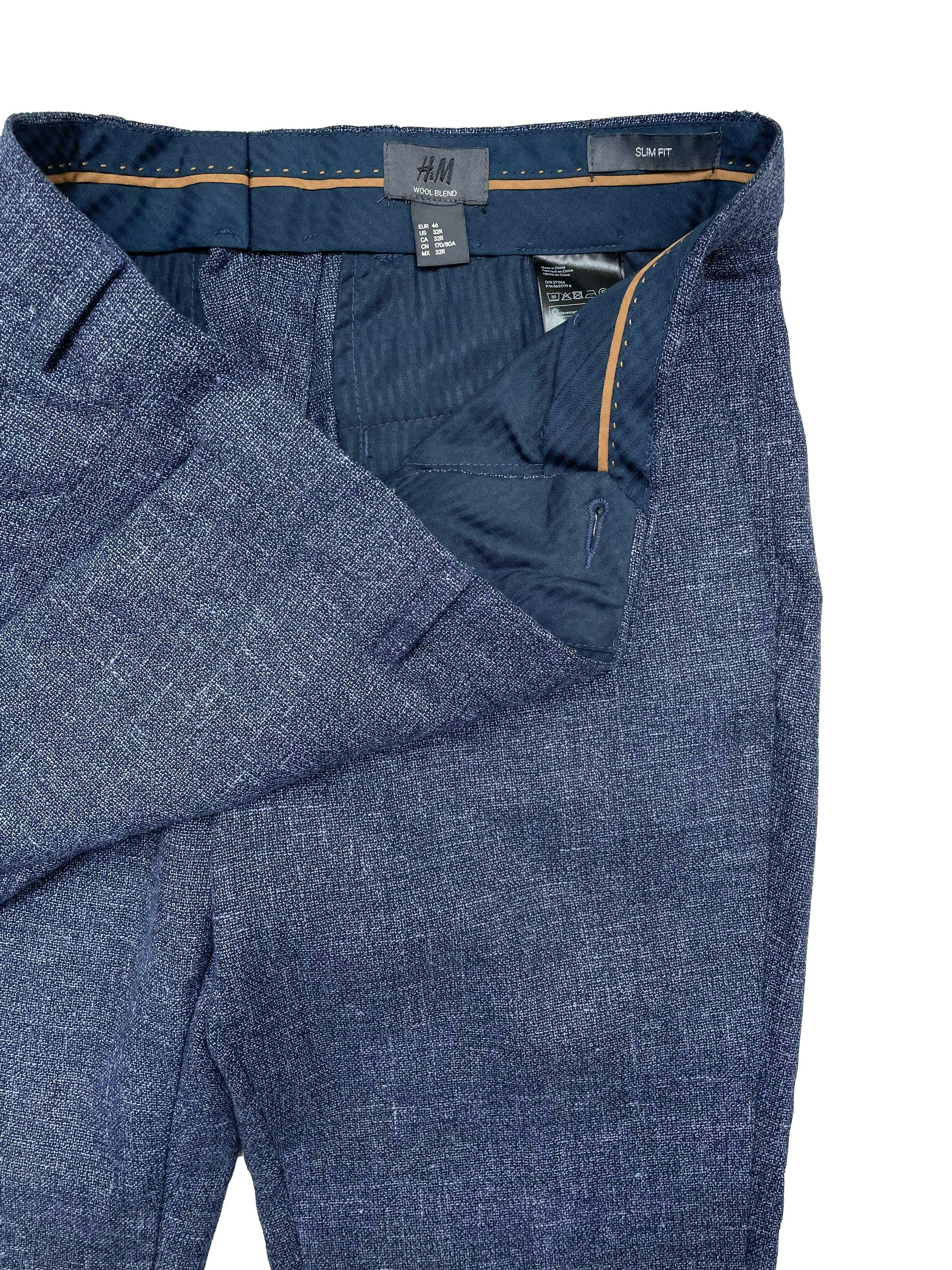 Pantalón slim H&M azul jaspeado de tweed con mezcla de lana y lino, tiene cuatro bolsillos. Cintura 86cm, Largo 105cm.