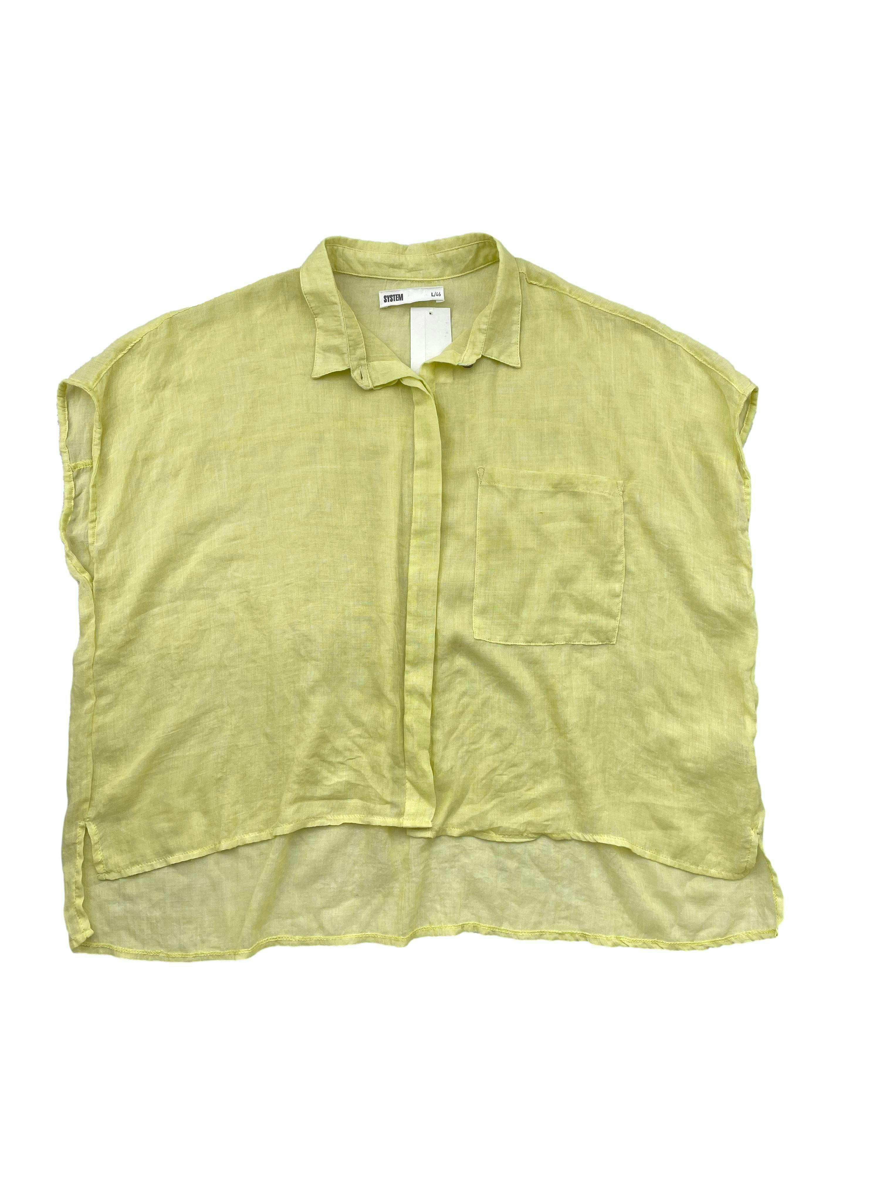 Blusa amarillo pastel de tela fresca tipo lino, con bolsillo frontal y aberturas laterales. Busto 148cm, Largo 52-60cm.