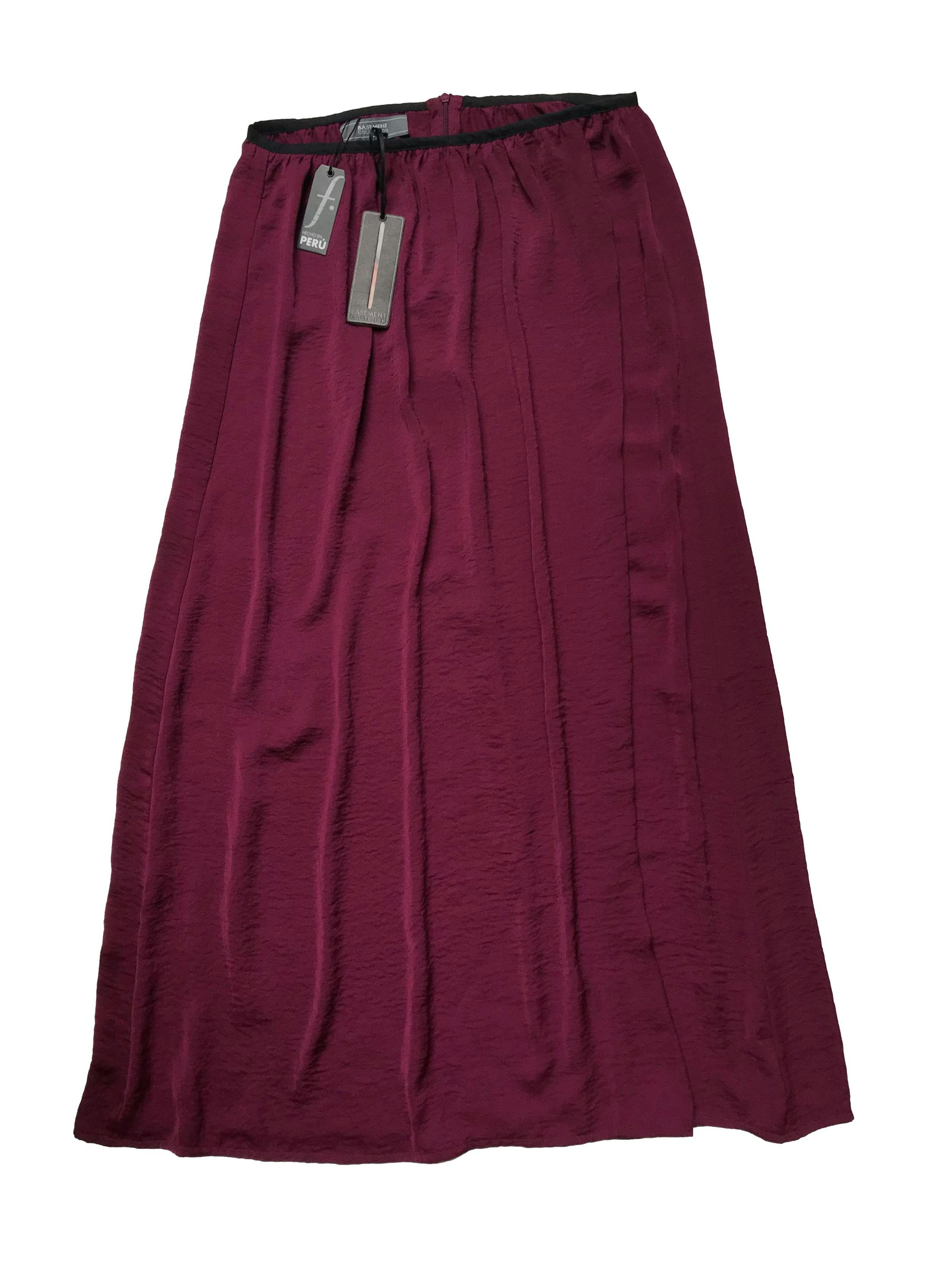 Falda larga Basement, guinda ligeramente satinada, tela sedosa, tiene cierre posterior. Cintura 76cm Largo 95cm . Nueva con etiqueta