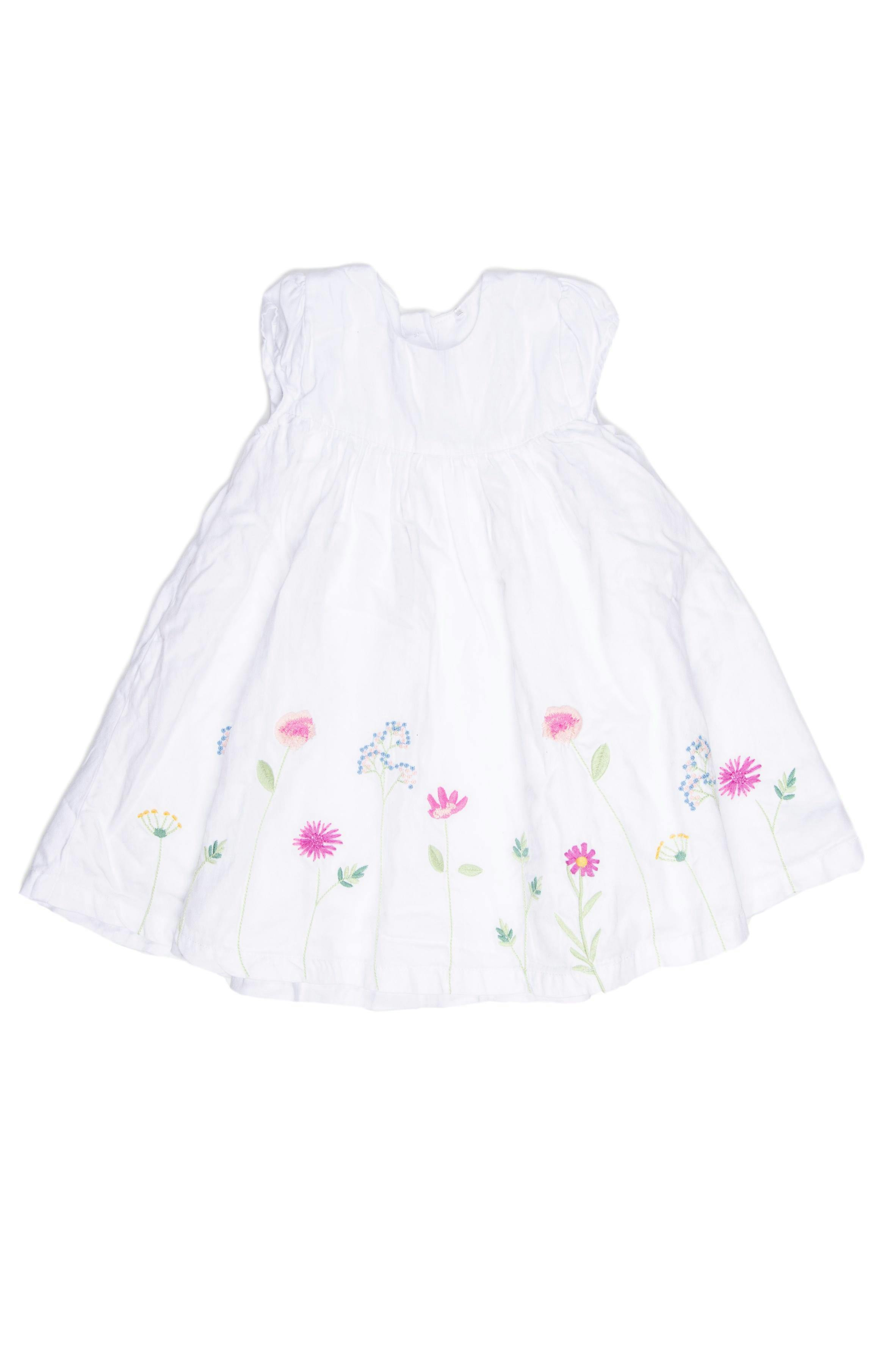 Vestido blanco con flores bordadas, forrado, 100% algodón. Viene con calzoncito de algodón estampado en juego. - Mothercare
