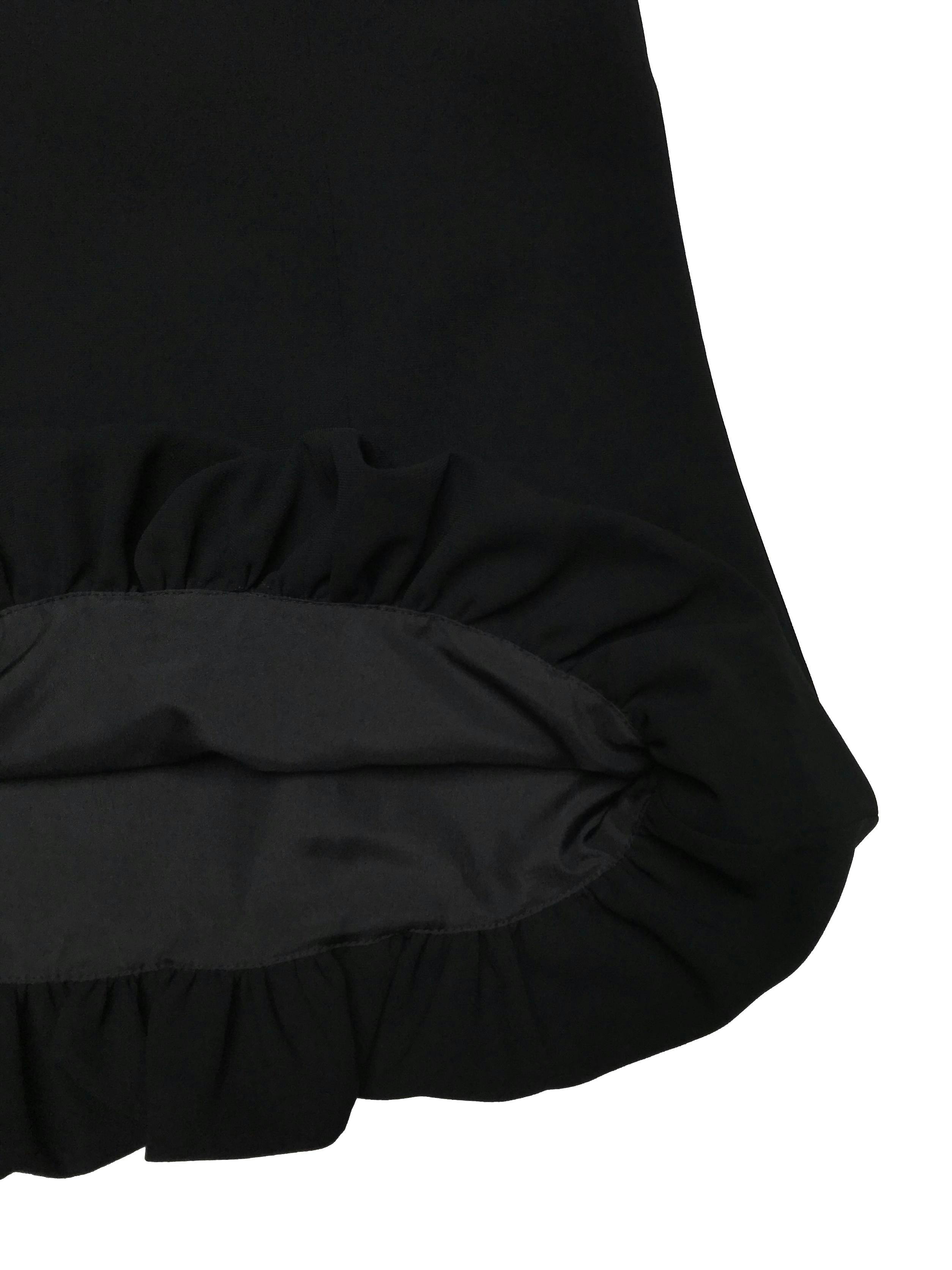 Falda formal Fina con basta globo, es forrada y tiene cierre lateral. Cintura 72cm Largo 55cm