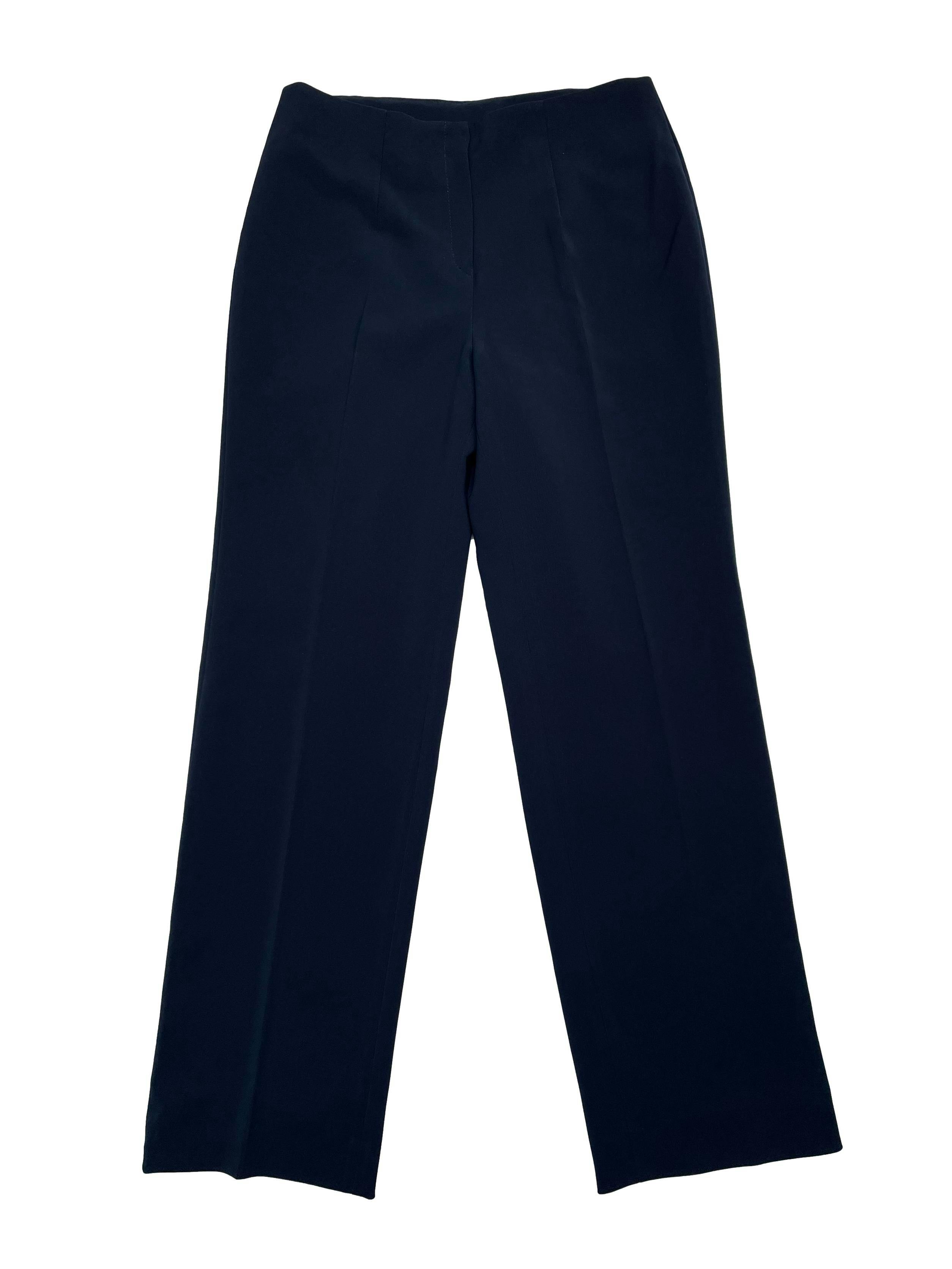 Pantalón formal azul, forrado, corte recto y cierre delantero. Cintura 70cm Tiro 26cm Largo 98cm