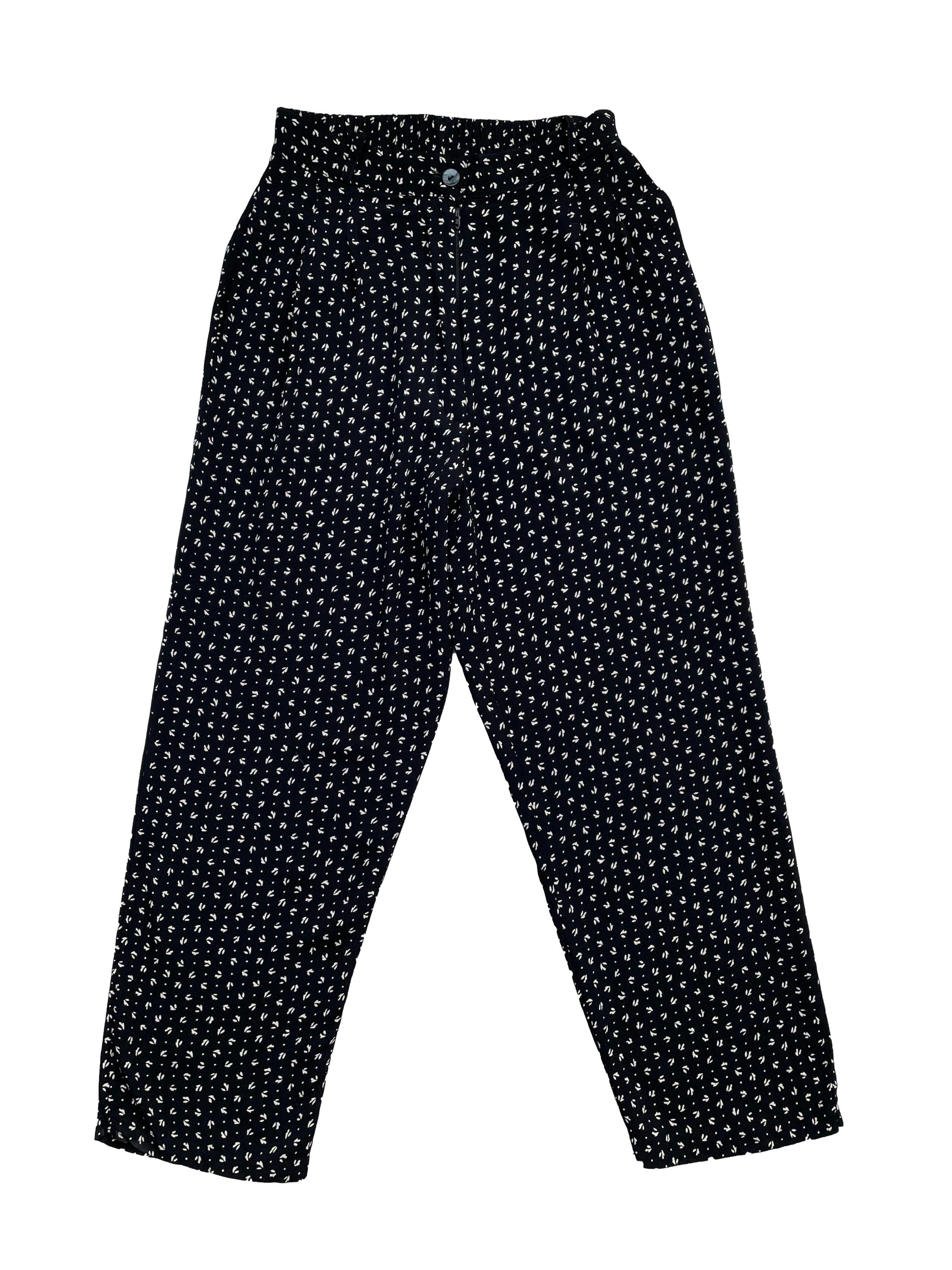 Pantalón vintage corte slim en blanco y negro ,con cintura elástica, bolsillos, presillas y cierre .Largo 91cm.