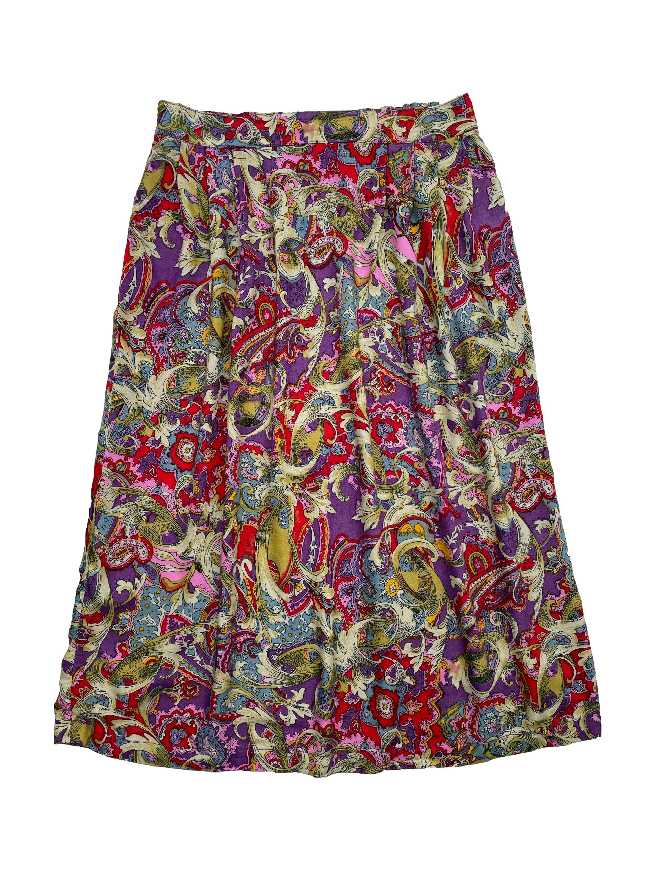 Falda midi vintage con estampado multicolor, elástico en la espalda y pliegues en cintura. Cintura 76 cm sin estirar, Largo 72cm. 
