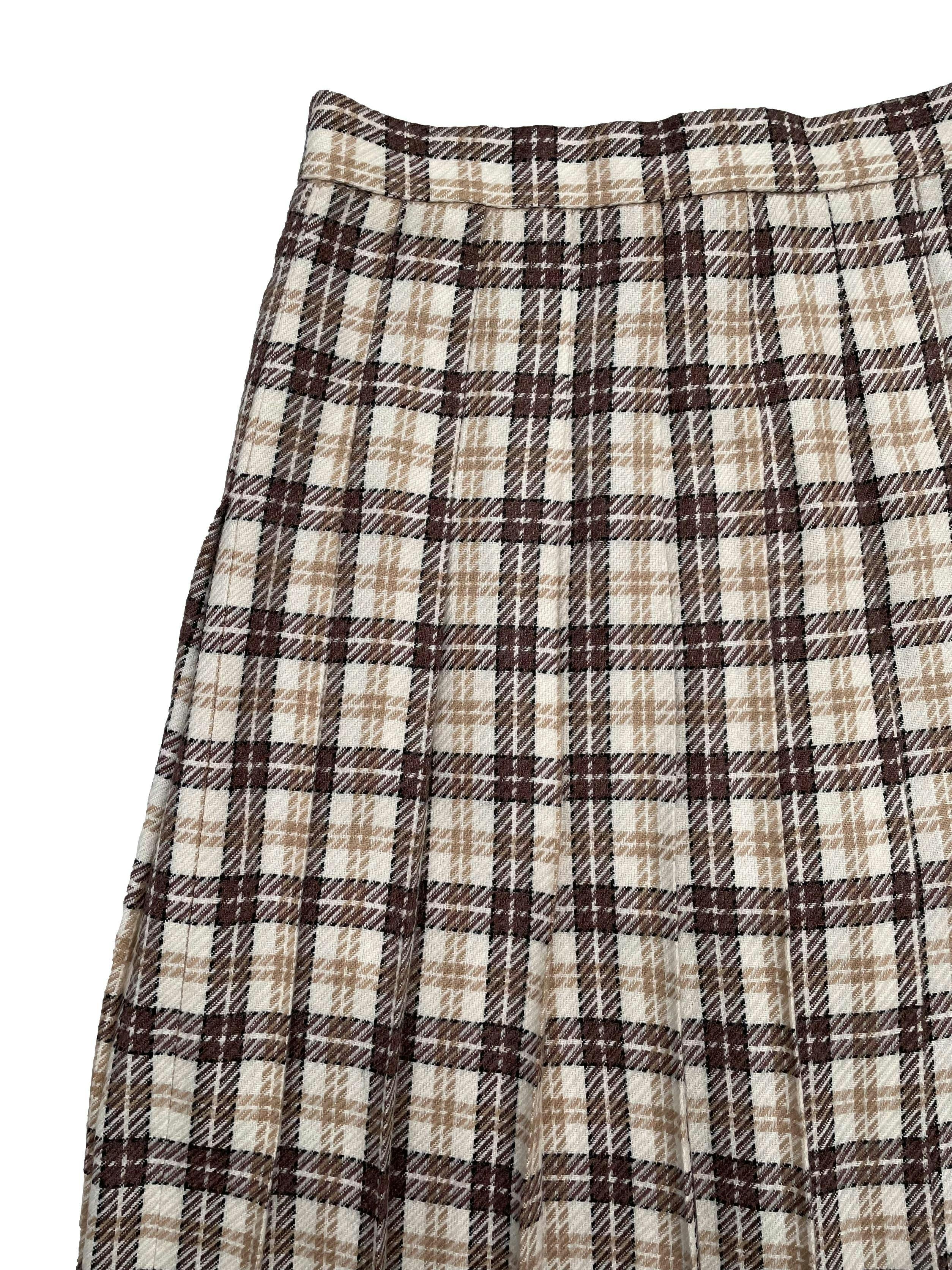 Falda Vintage de lanilla escocesa en beige y marrón. Con tableros, cierre y botón posterior. Cintura 74cm, Largo 72cm.