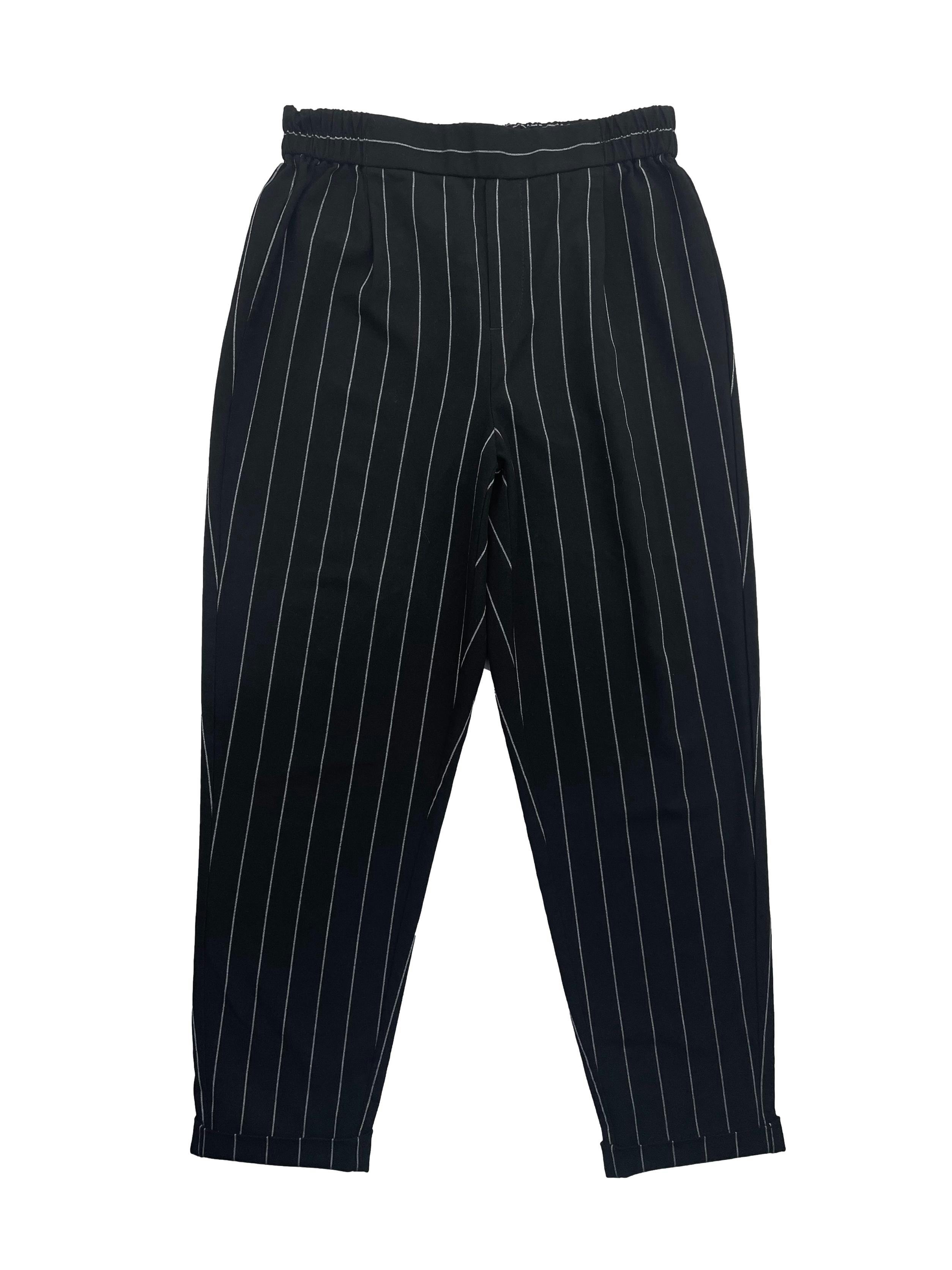 Pantalón Sybilla negro con rayas blancas, con elástico en la pretina Cintura: 66cm (sin estirar), Tiro 28cm Largo: 91cm