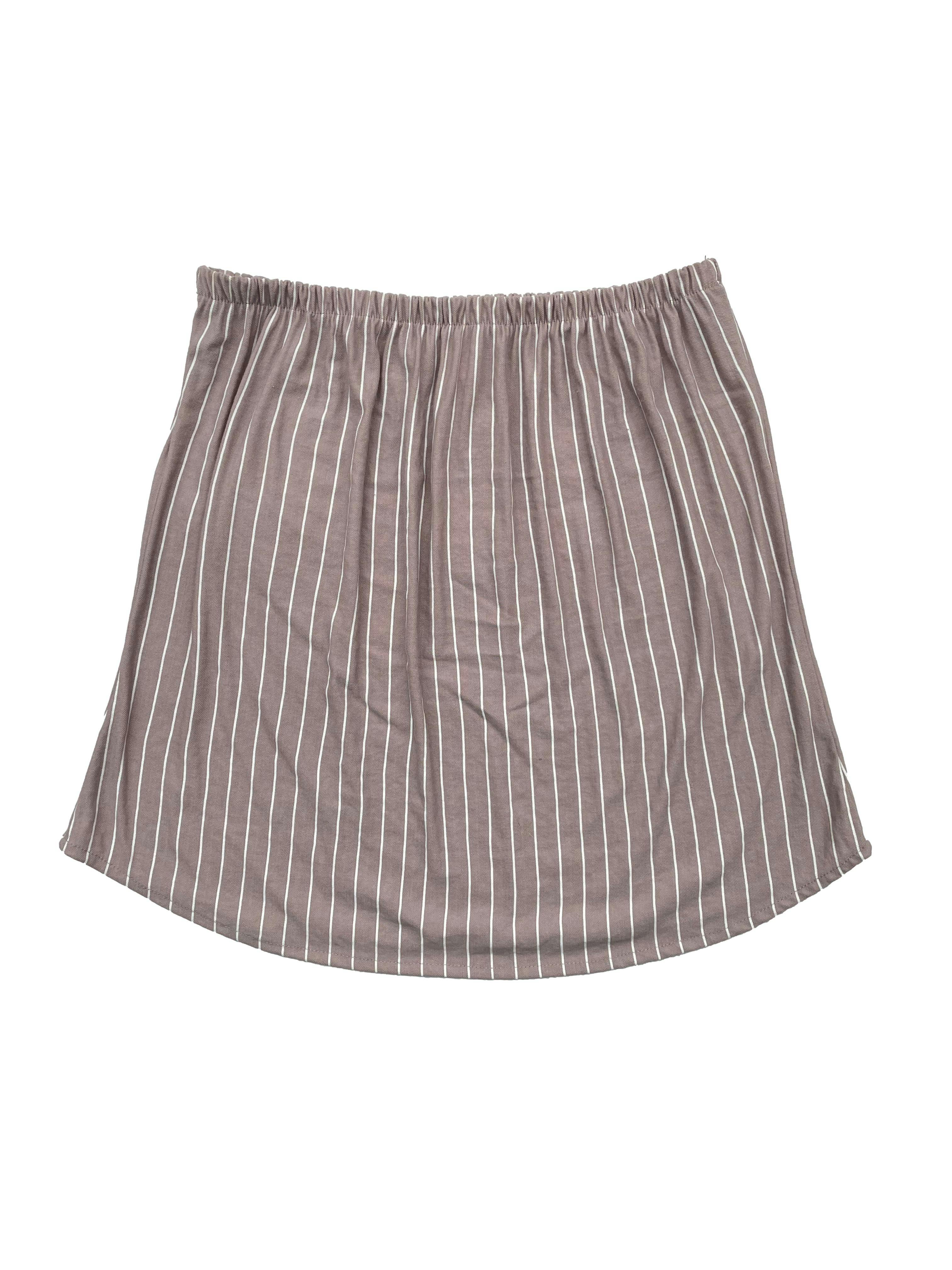 Falda Dunkelvolk color arena con rayas crema, tela fresca y ligera, cintura elasticada. Cintura 60cm sin estirar, Largo 35cm.