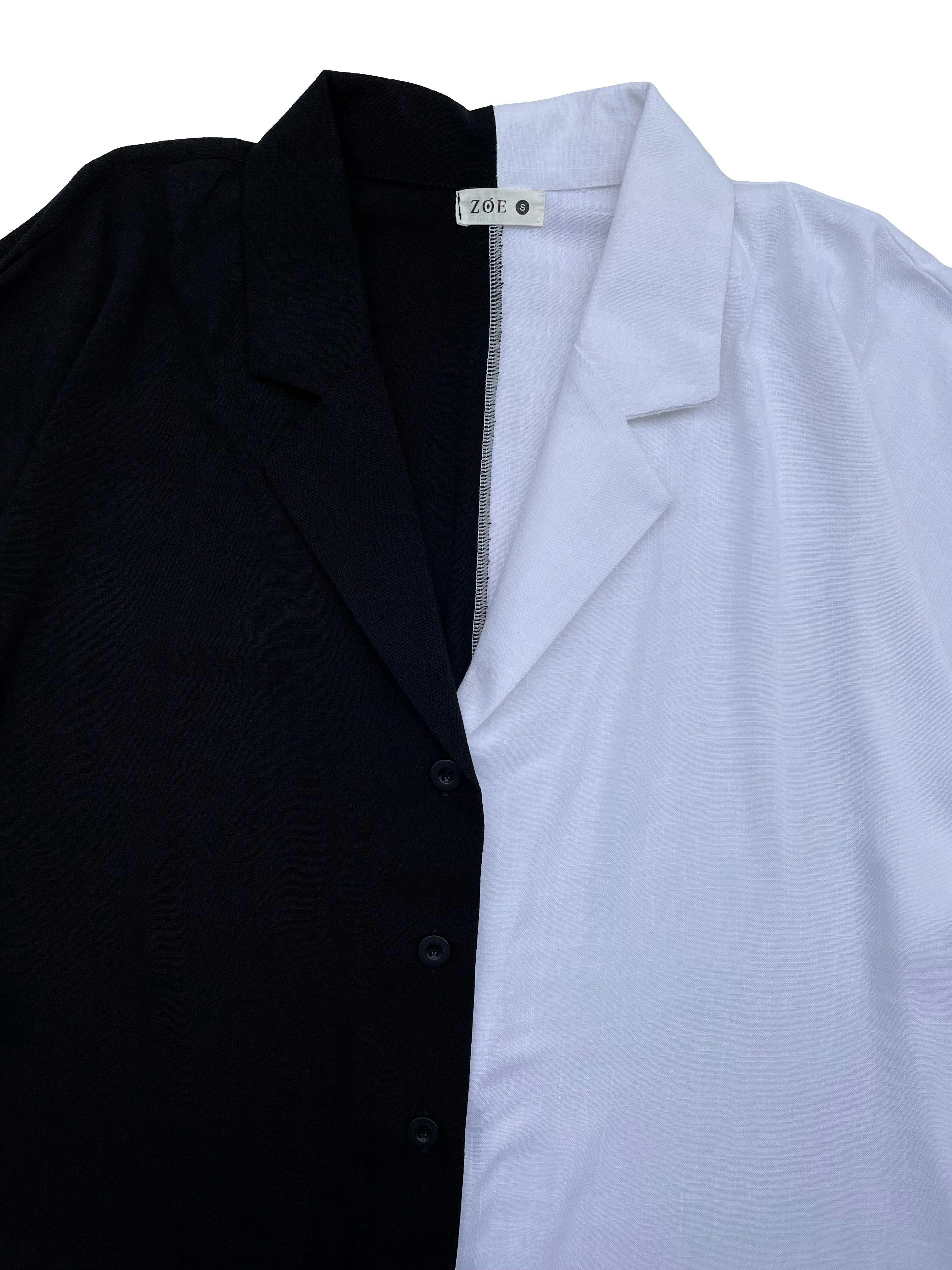 Blusa oversized Zoe color block blanco y negro, tela con caída, cuello cubano y botones. Busto 120cm Largo 60cm