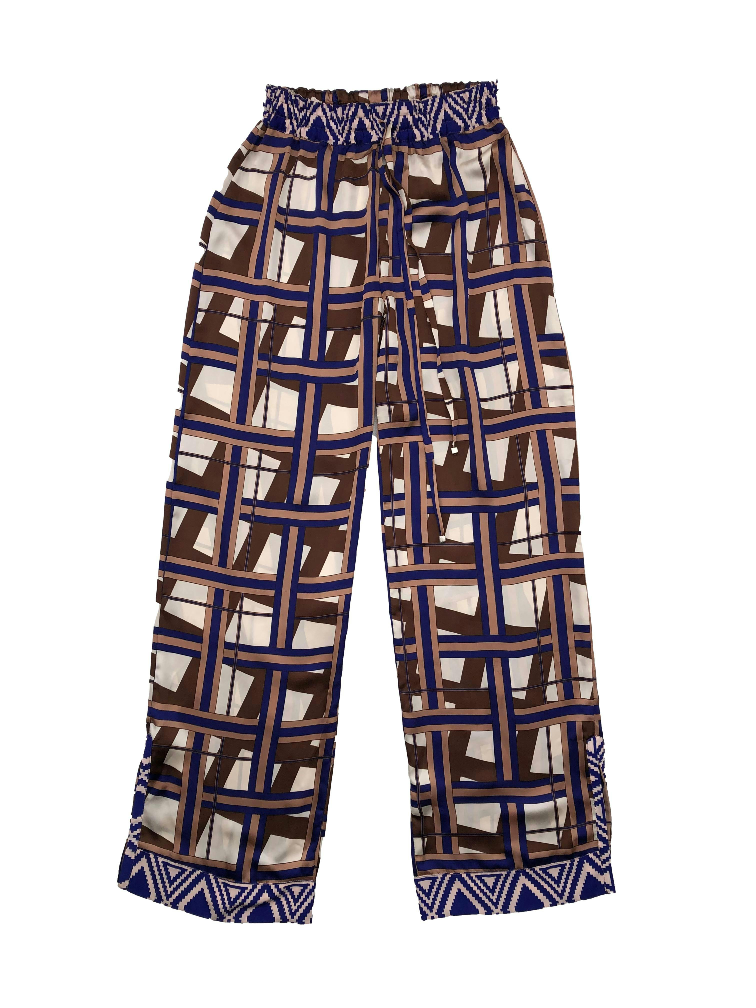 Pantalón palazzo con print geométrico en tonos azules y marrones, tela sedosa, pretina elástica, cordón y aberturas laterales. Cintura 66cm sin estirar, Largo 112cm.